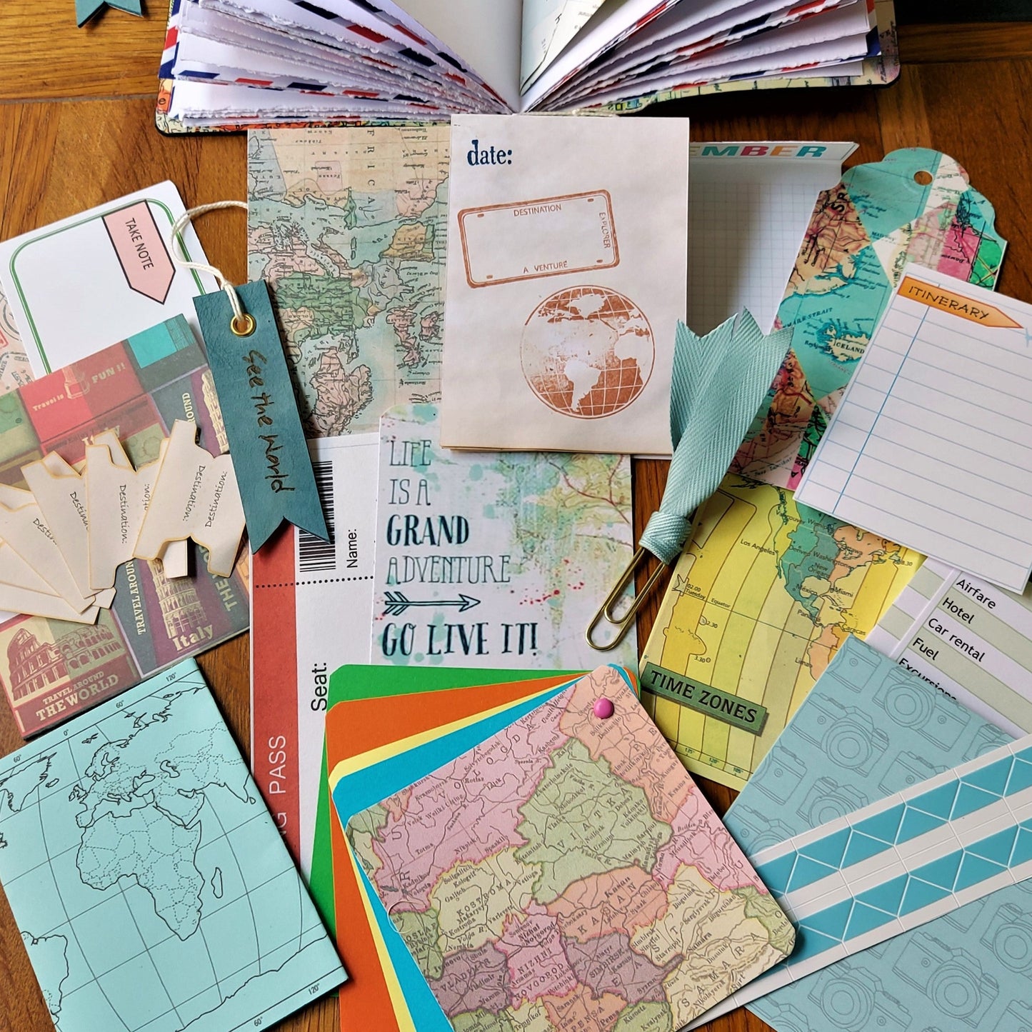 Assorted travel ephemera included inside the leather travel journals by bespoke bindery
