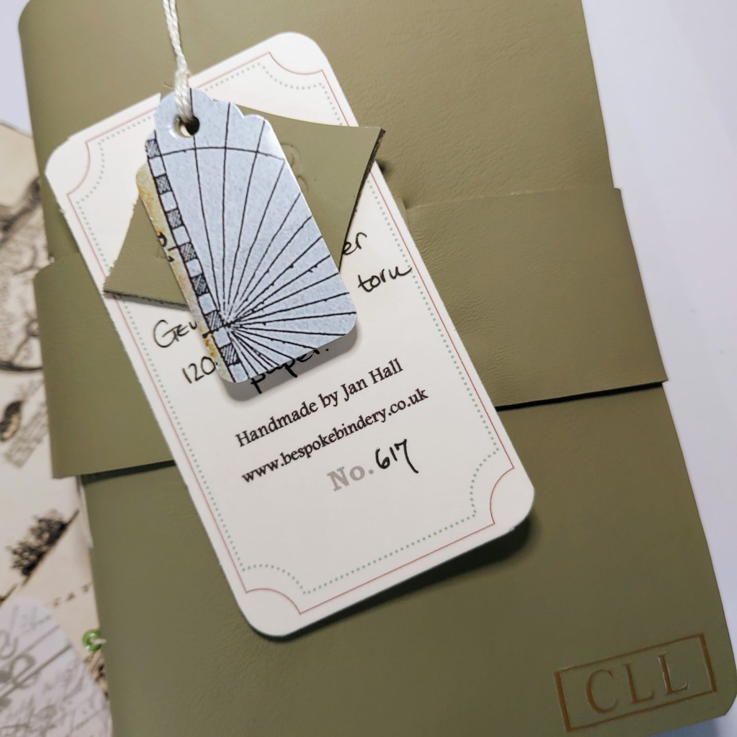 Leather travel journal in Olive green with tag and gold hot foil personalisation initials
