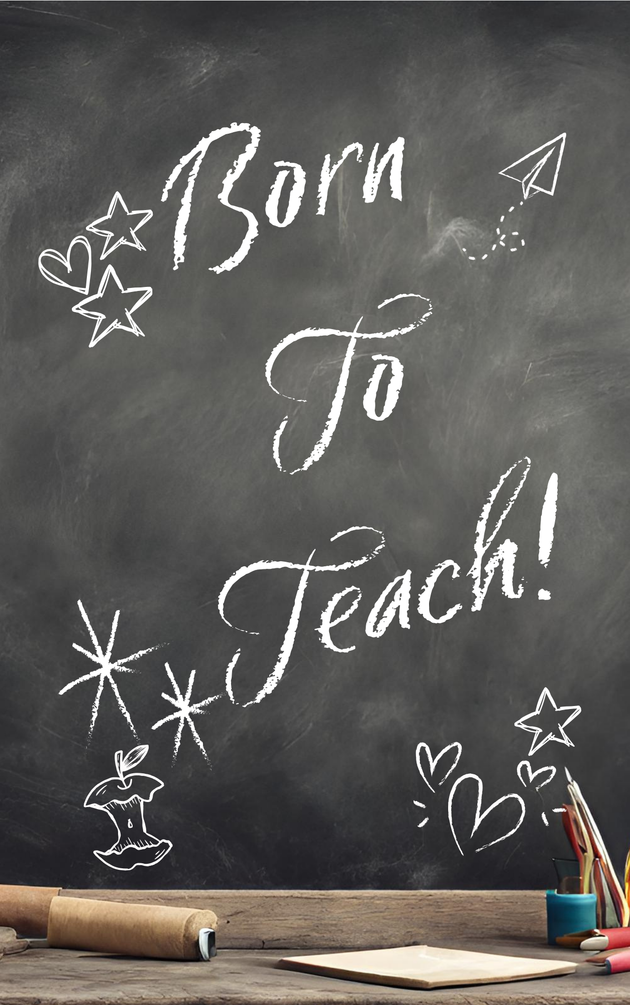 Chalkboard with 'Born To Teach!' text and educational supplies on a desk.