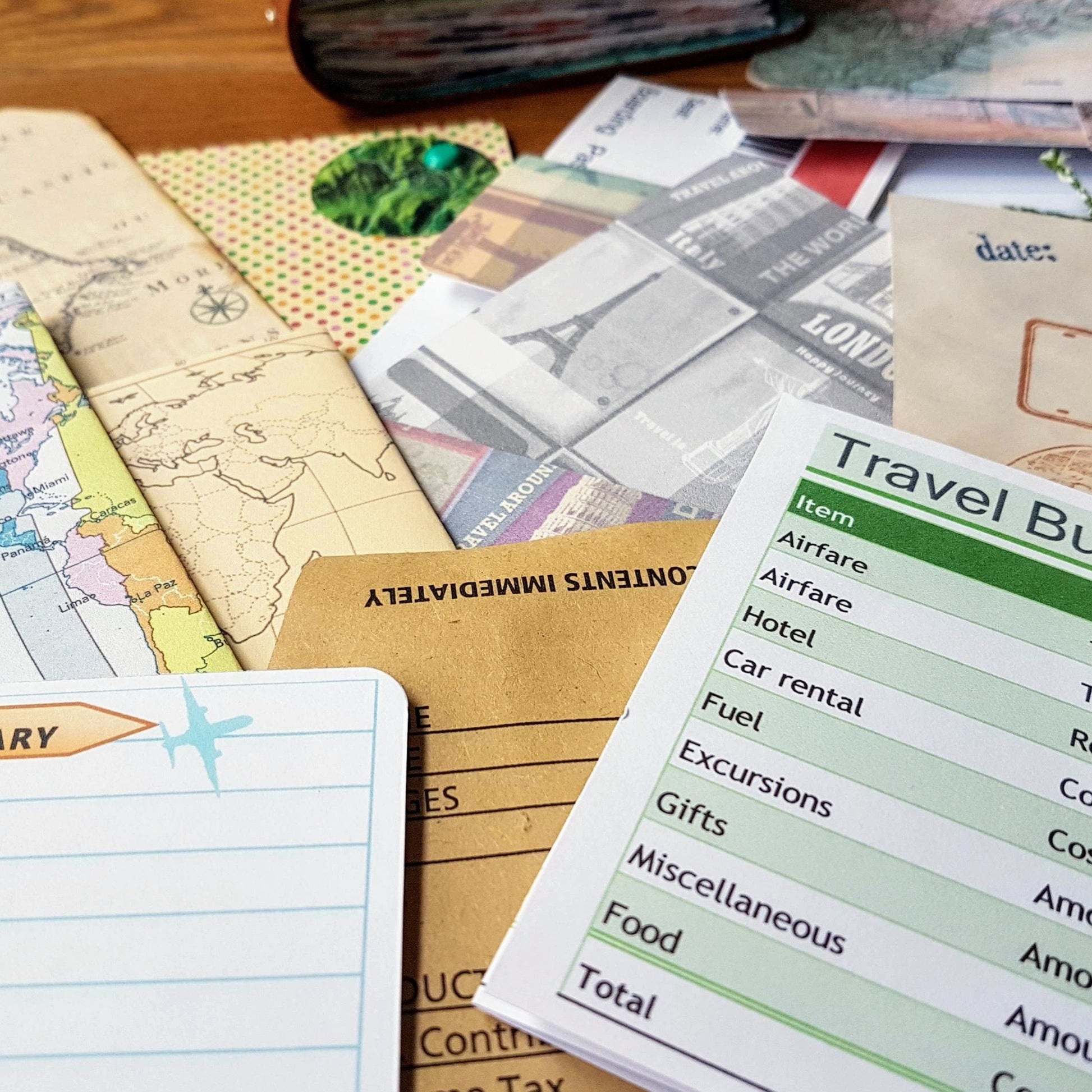 papers, tickets, journal cards inside leather travel journal