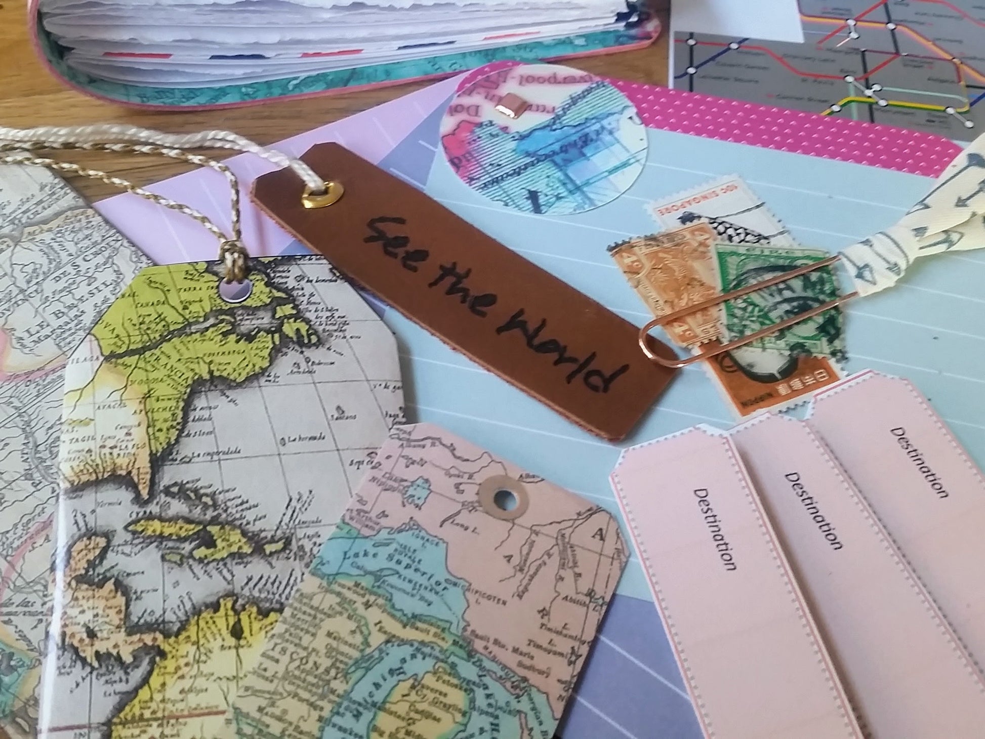 tags and stamps in a bespoke bindery leather travel journal