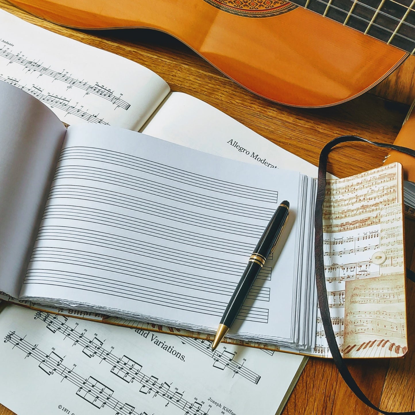 blank music stave leather journal with spanish guitar and mont blanc pen