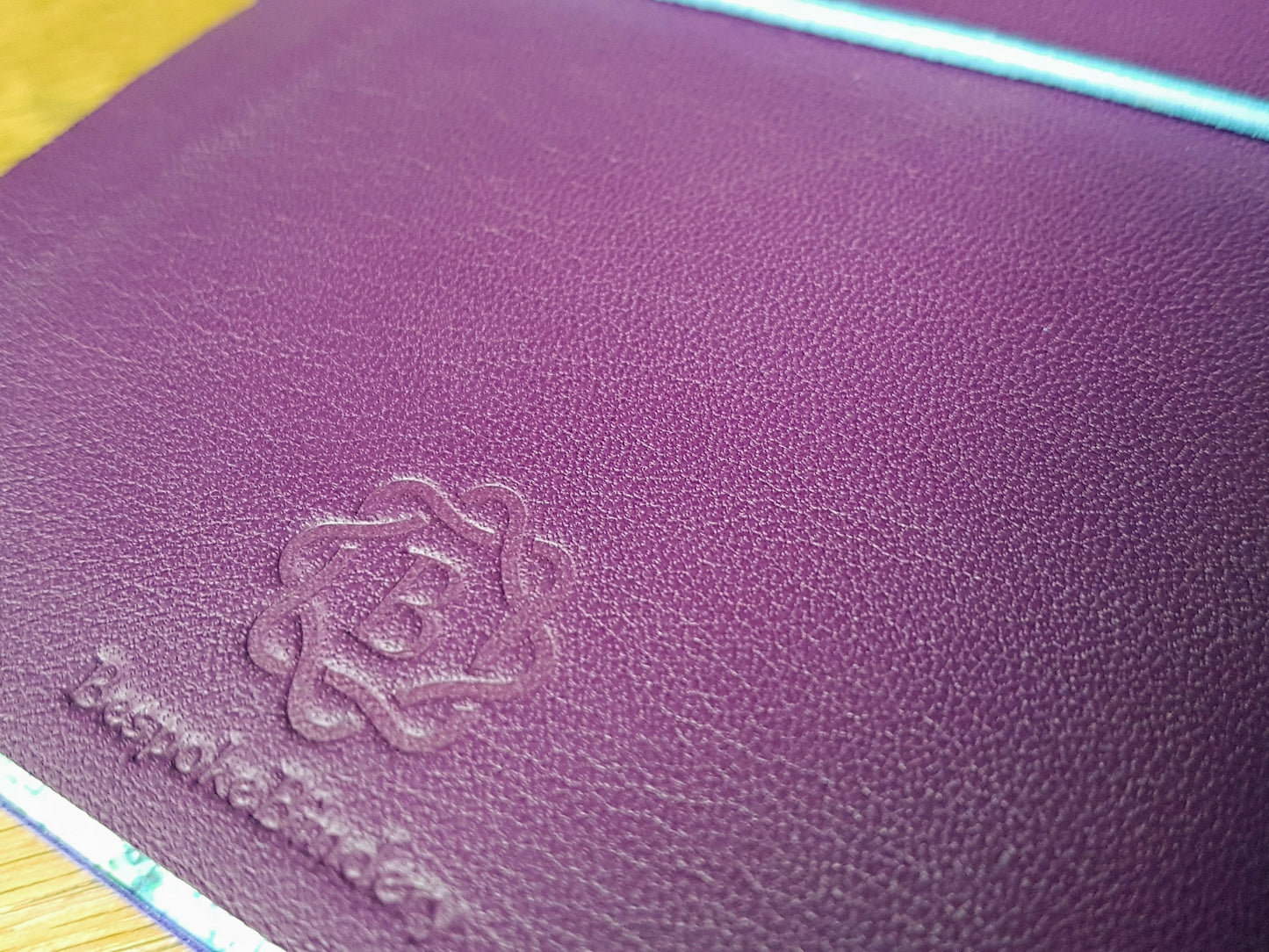 Purple plum spanish leather travel journal with Bespoke Bindery logo