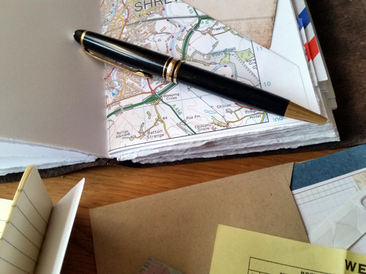 Travel journal with map tuck spot