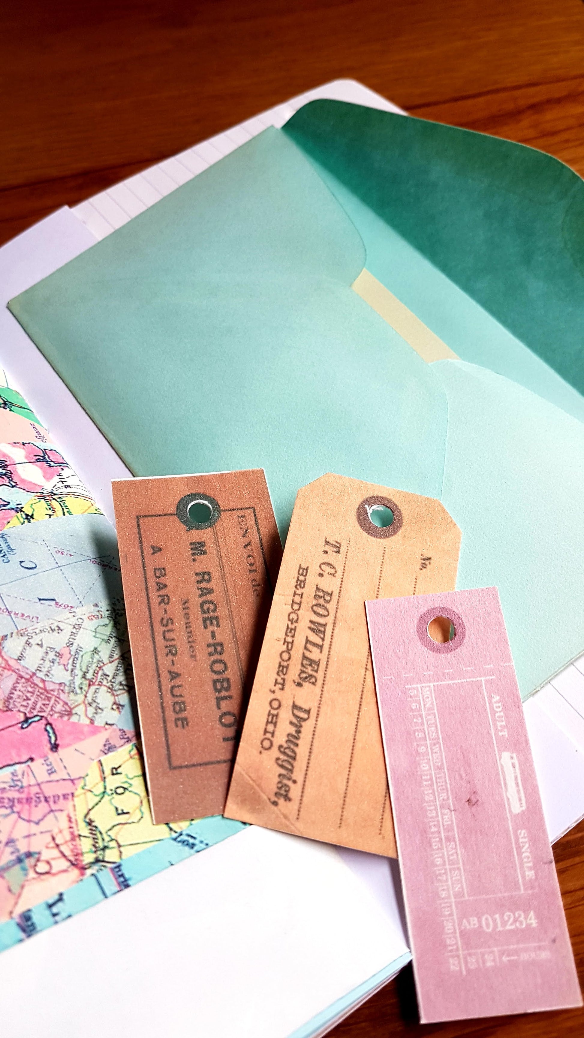 Vintage envelope and price tag ephemera inside Naked Junk Journal by Bespoke Bindery