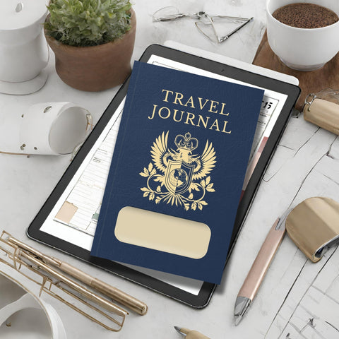 Dark Blue Passport style travel journal planner on a desk