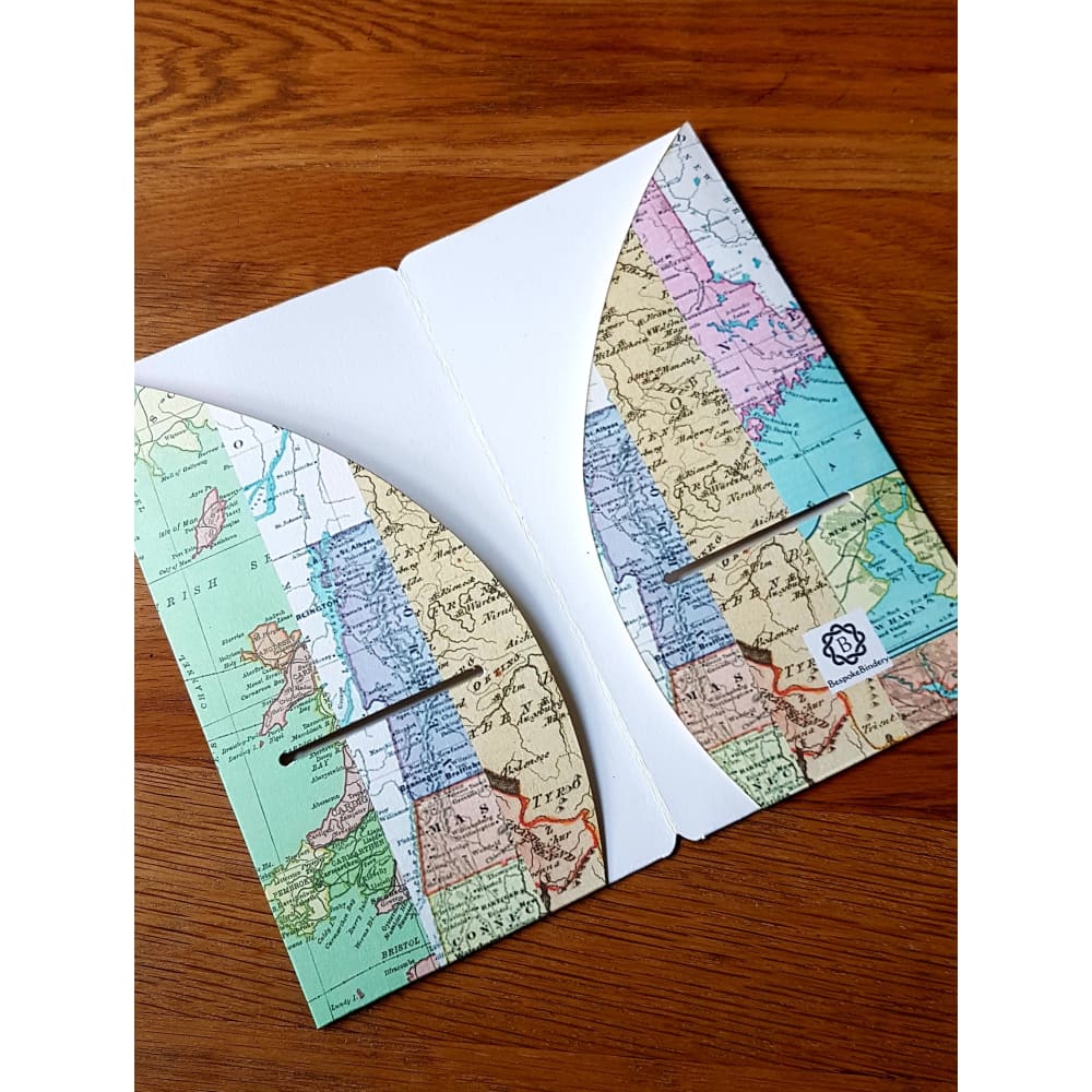 inside view of 4 pocket Midori Traveler Notebook TN dashboard folder insert in a Map Stripe print