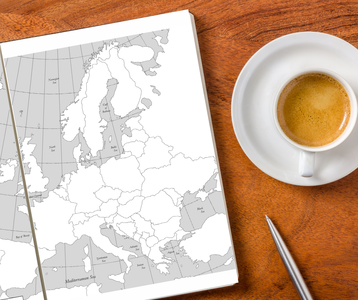 double page spread of a blank map of Europe inside the travel journal.