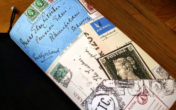 Inside a leather TN cover - vintage postal themed Midori Traveler Notebook TN dashboard folder insert
