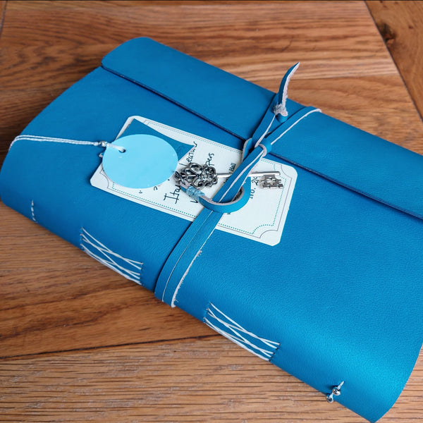 A5 Leather Travel Journal with wrap around cover in Bermuda Blue with key trim
