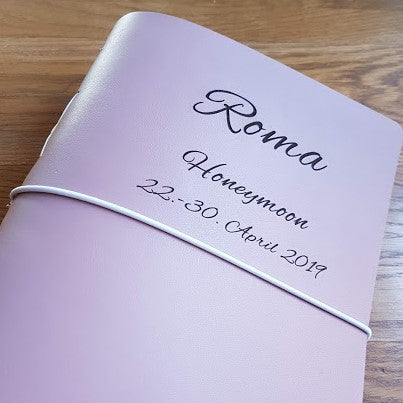 laser etched lilac leather journal cover with cursive font