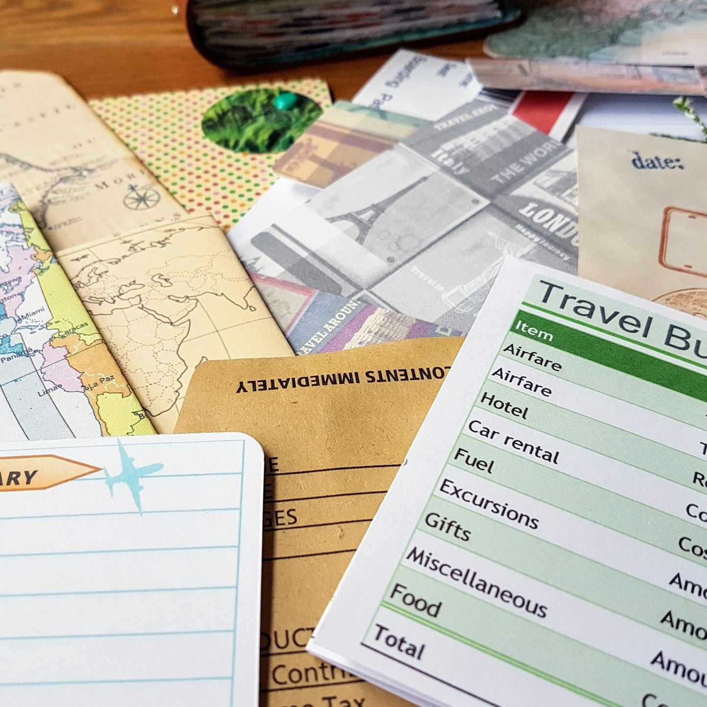 papers, tickets, journal cards inside leather travel journal