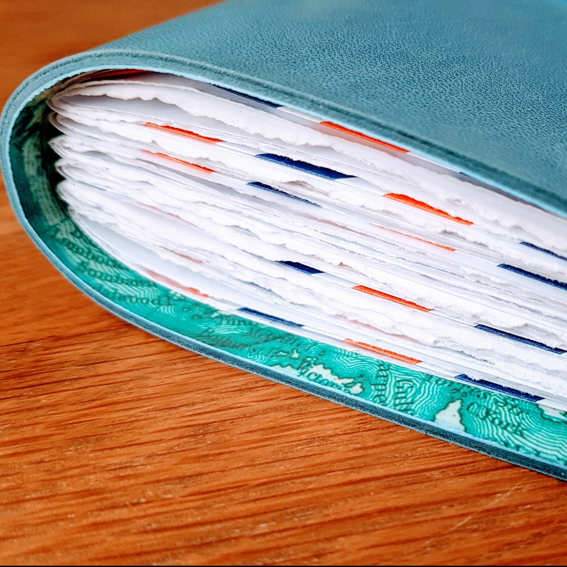 Leather travel journal with hand torn pages