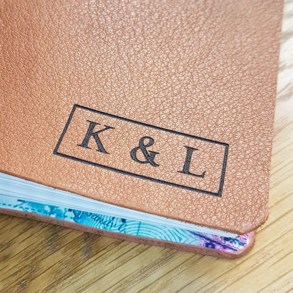add initials to the front of a travel journal