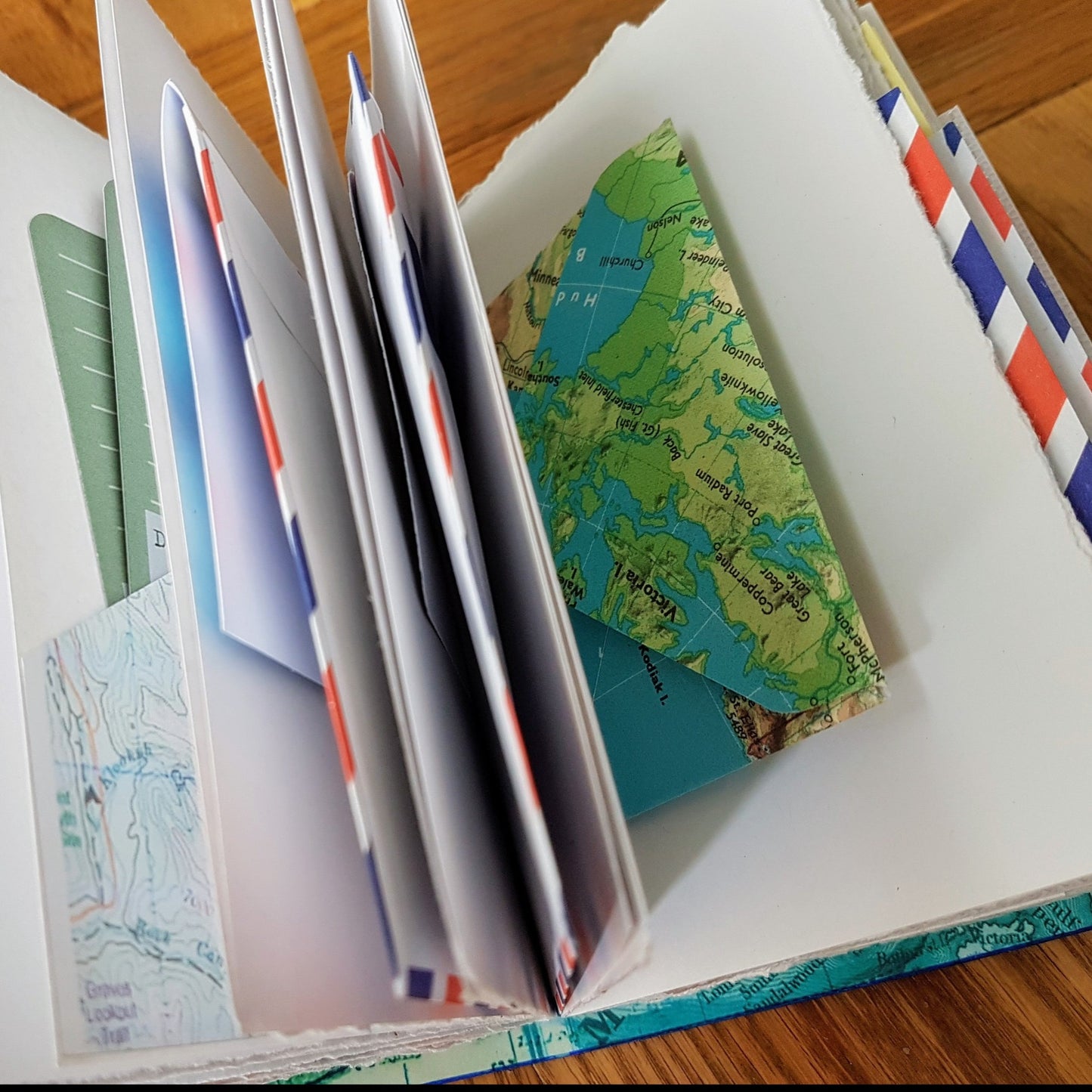 envelope pocket pages inside bespoke bindery travel journals