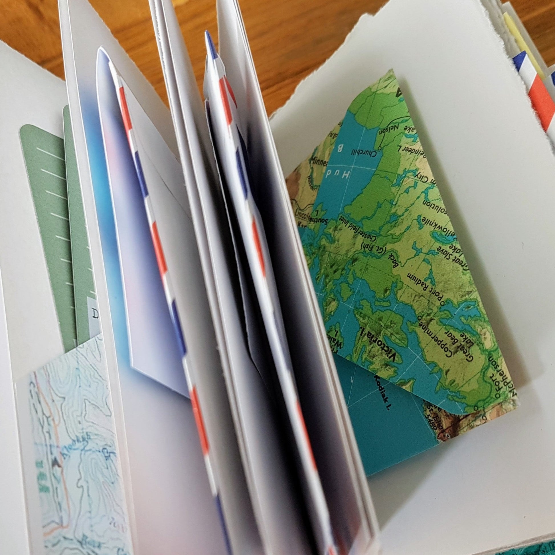 envelope pocket pages inside bespoke bindery travel journals