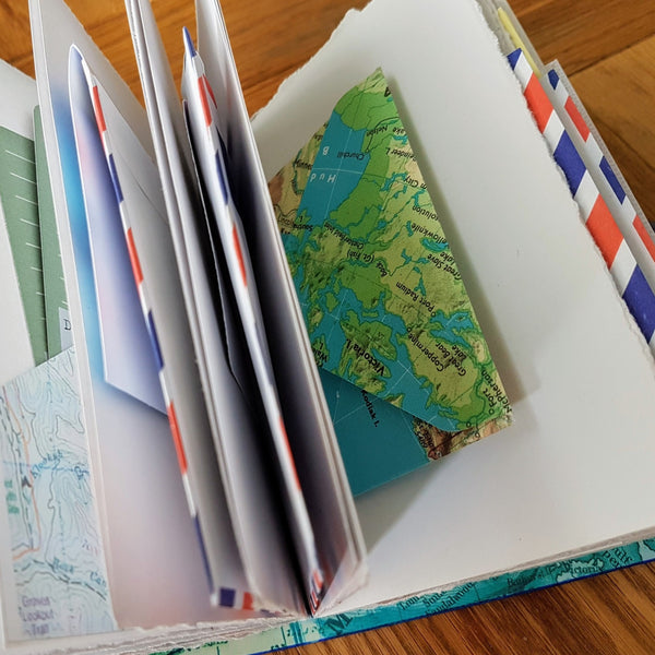 envelope pocket pages inside bespoke bindery travel journals