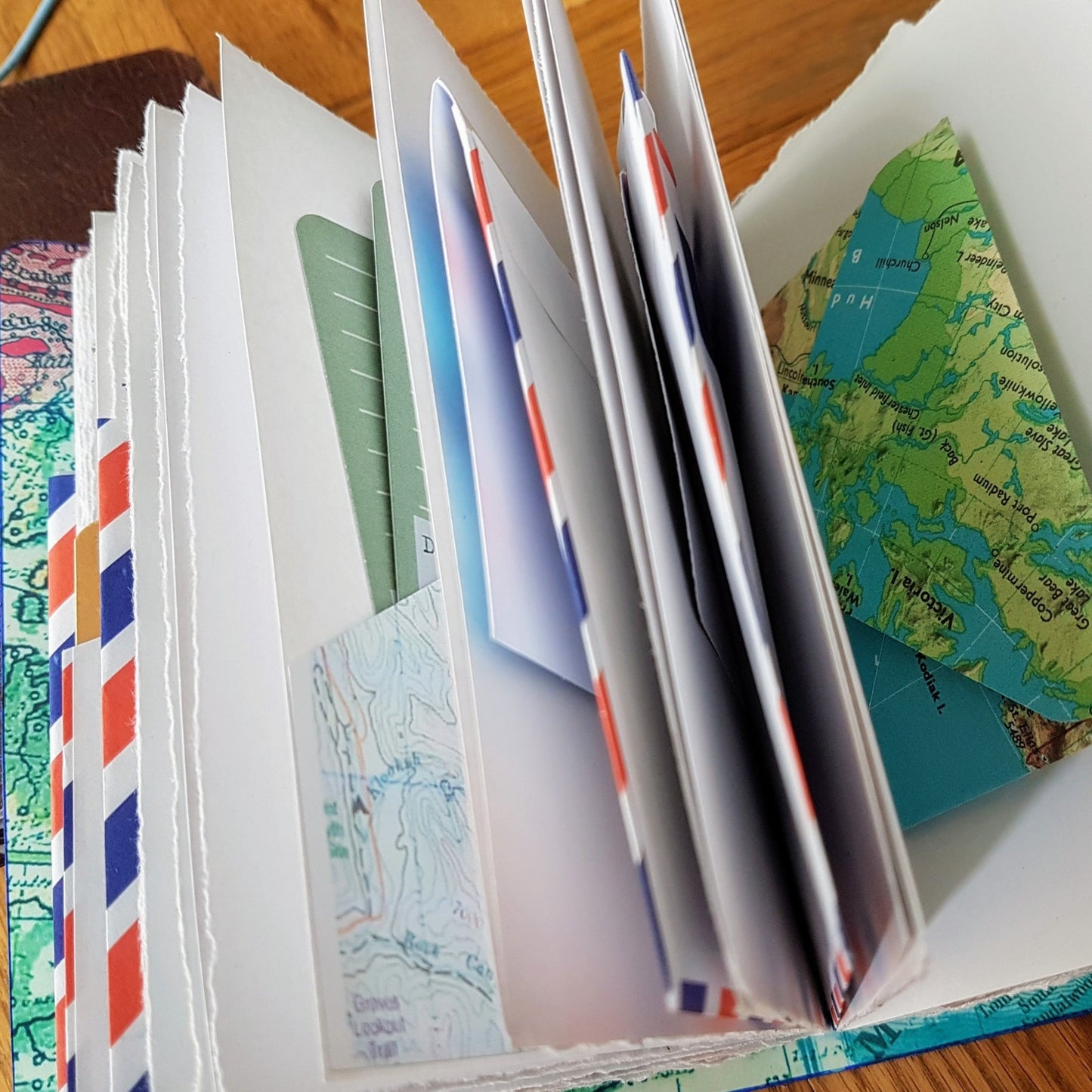 envelope pocket pages inside bespoke bindery travel journals