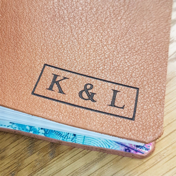 A5 personalised leather travel journal showing laser engraved initials