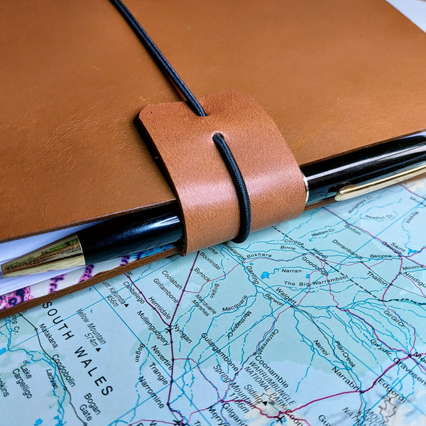 Golden Brown Leather Australia Travel Journal with protective edge cuff acting as pen loop