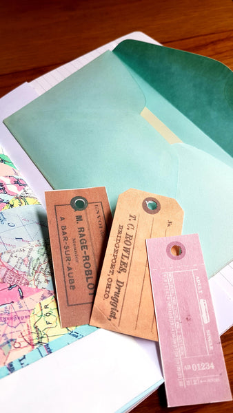 Vintage envelope and price tag ephemera inside Naked Junk Journal by Bespoke Bindery