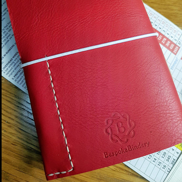  red leather golf journal notebook rear view, hand stitched leather pencil pocket