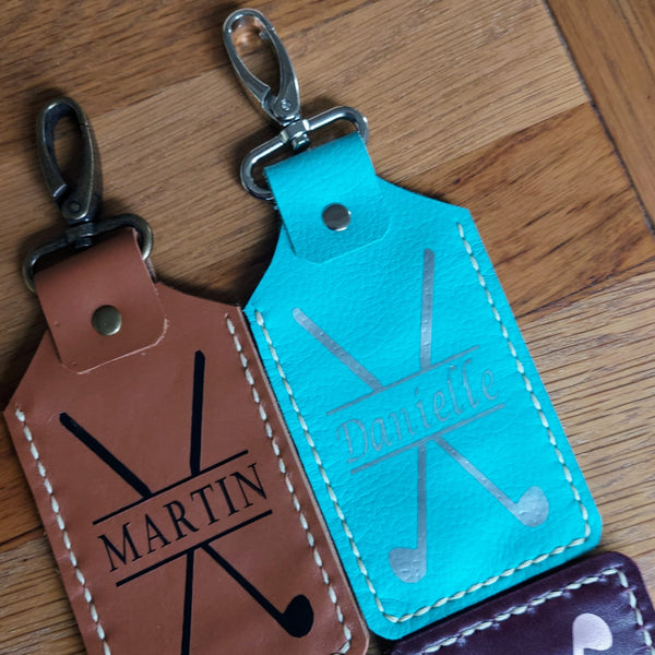 light blue and brown leather golf tee holder tags