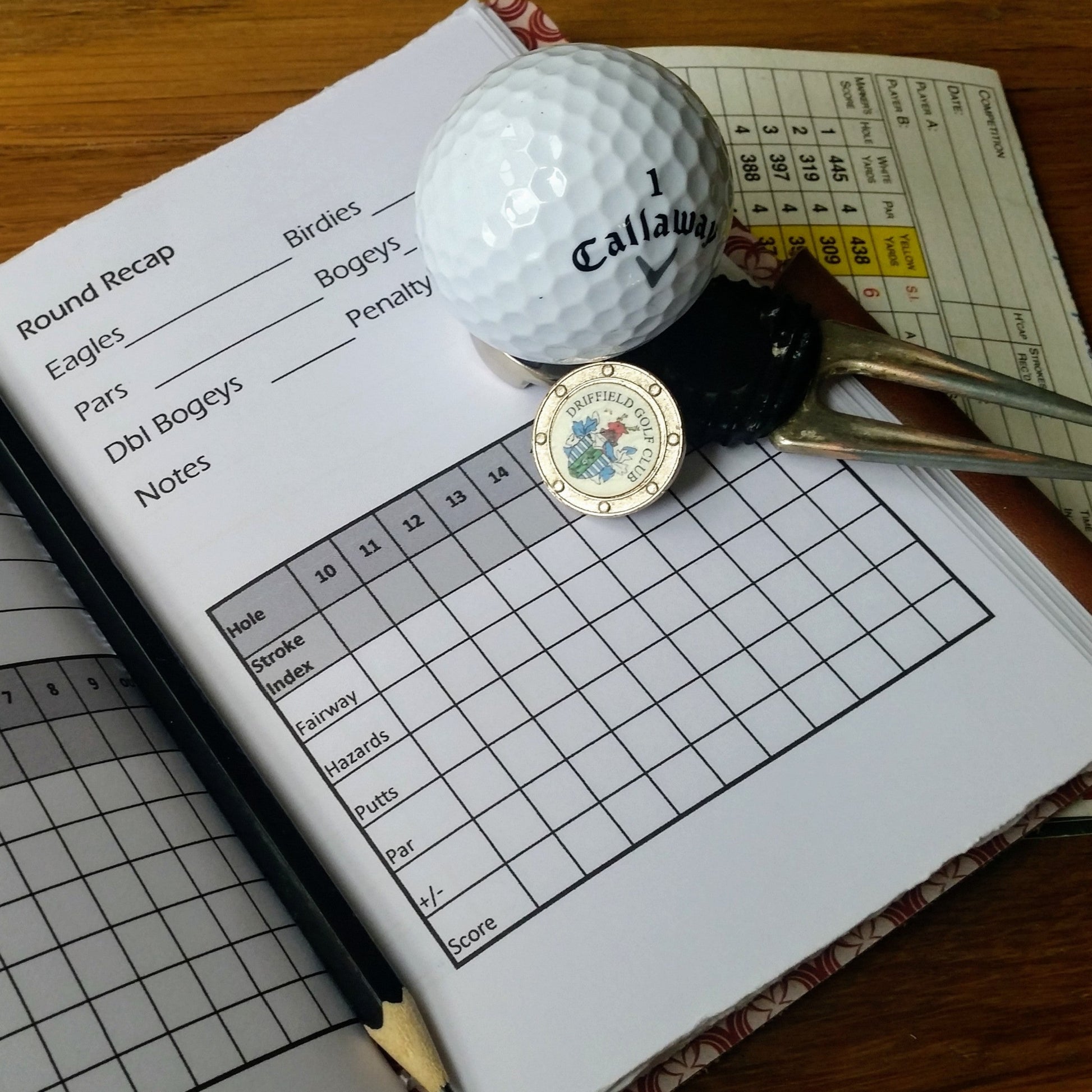 brown leather golf journal gift for men.  Golf score card record