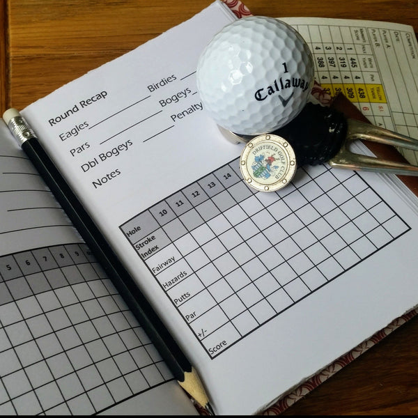 darkest green leather golf journal gift for men.  Golf score card grid record