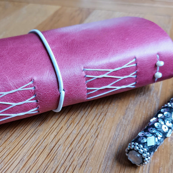 pink leather travel journal handstitched yapp binding with elastic closure Hawaiian Aloho theme