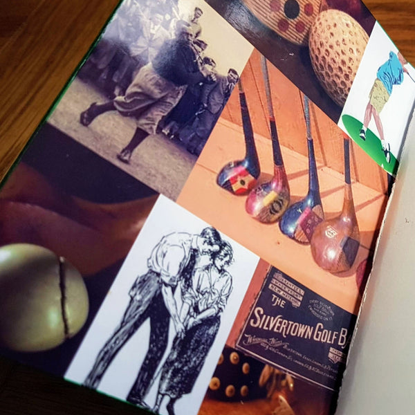 vintage golfing images line the leather cover of the golf journal