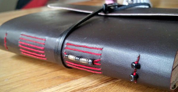 Dark Brown handmade leather journal with red long stitch and beaded spine