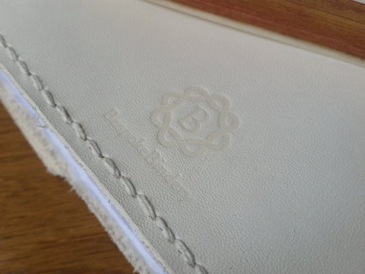 Bespoke Bindery Logo and hand stitched edge using double needle method