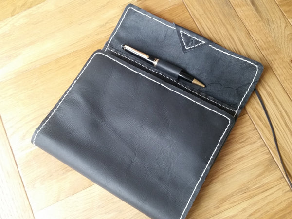 handstitching around leather portfolio case