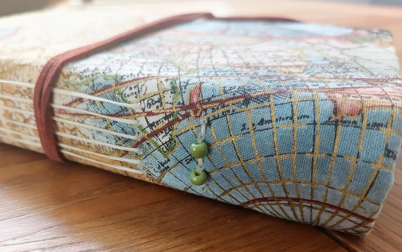 fabric travel journal vegan option with abstract world map